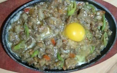 Famous Sizzling Sisig Topped with Whole Egg