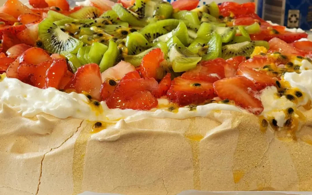 Strawberry-Kiwi Pavlova with a Touch of Passion Fruit
